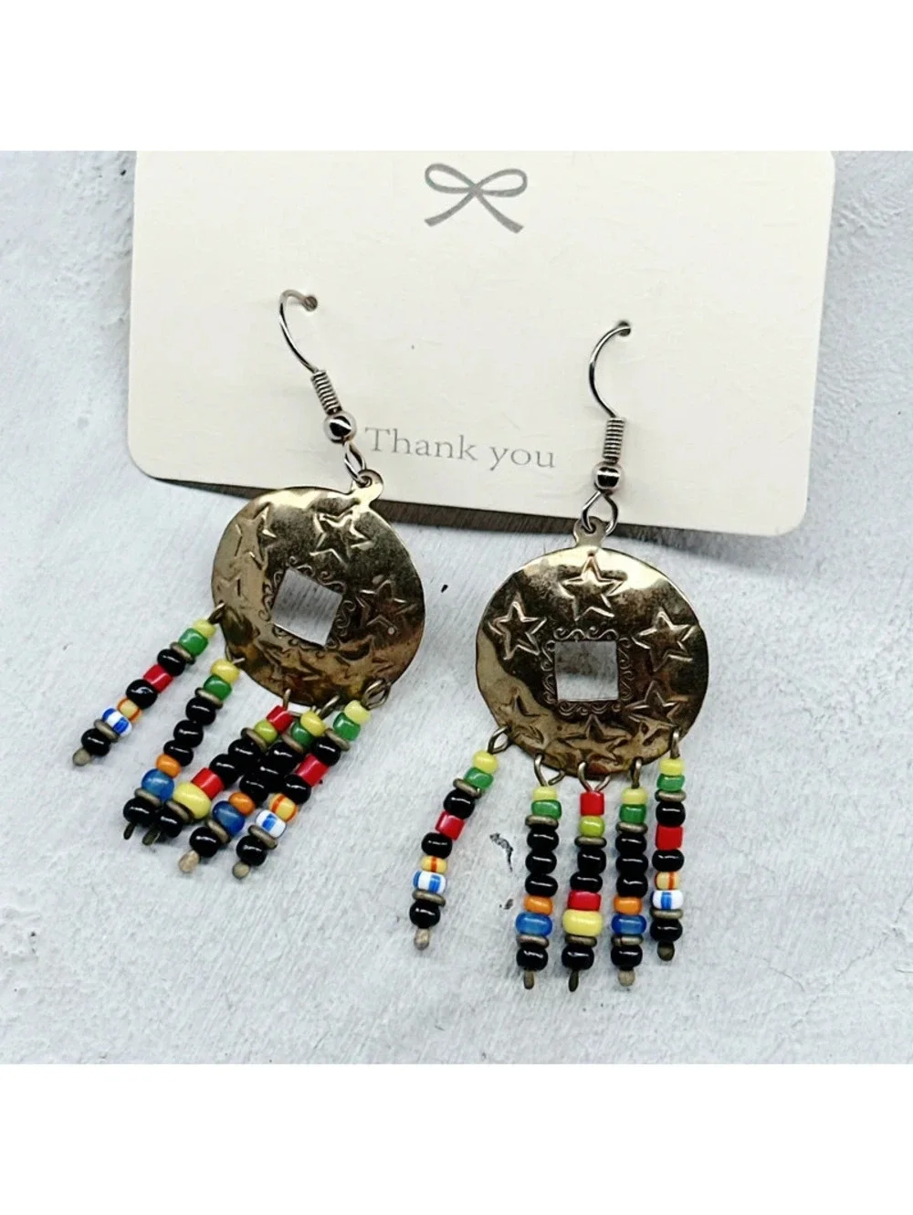 824mc. Goldtone Star Whimsigoth Earrings